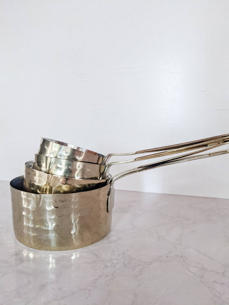 gold measuring cups
