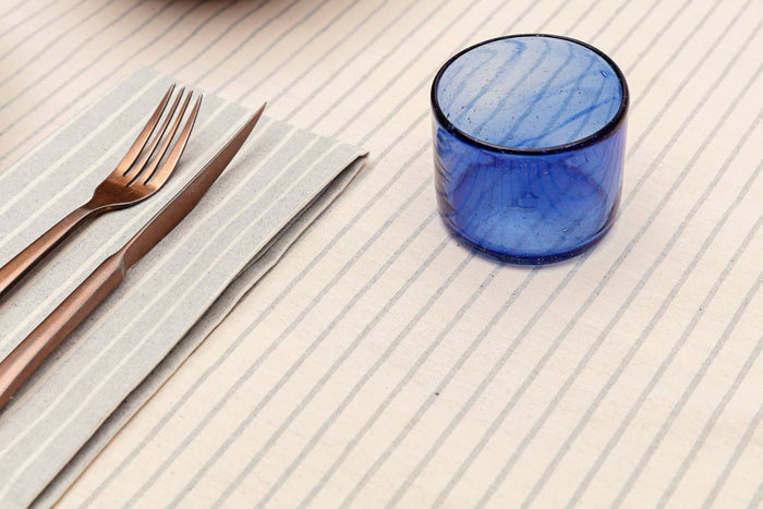 California casual style dining with tablecloth and place setting