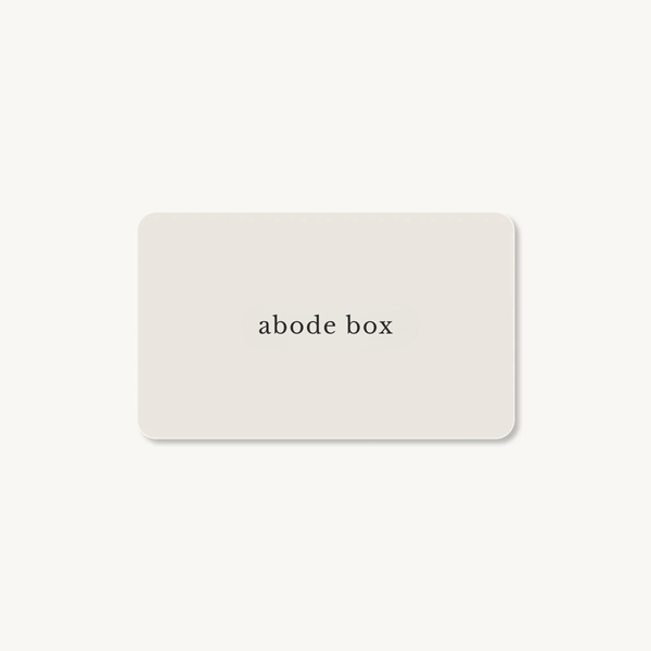 E-gift card with 'abode box' text on a light gray background