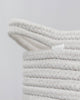 cream and white storage basket handle