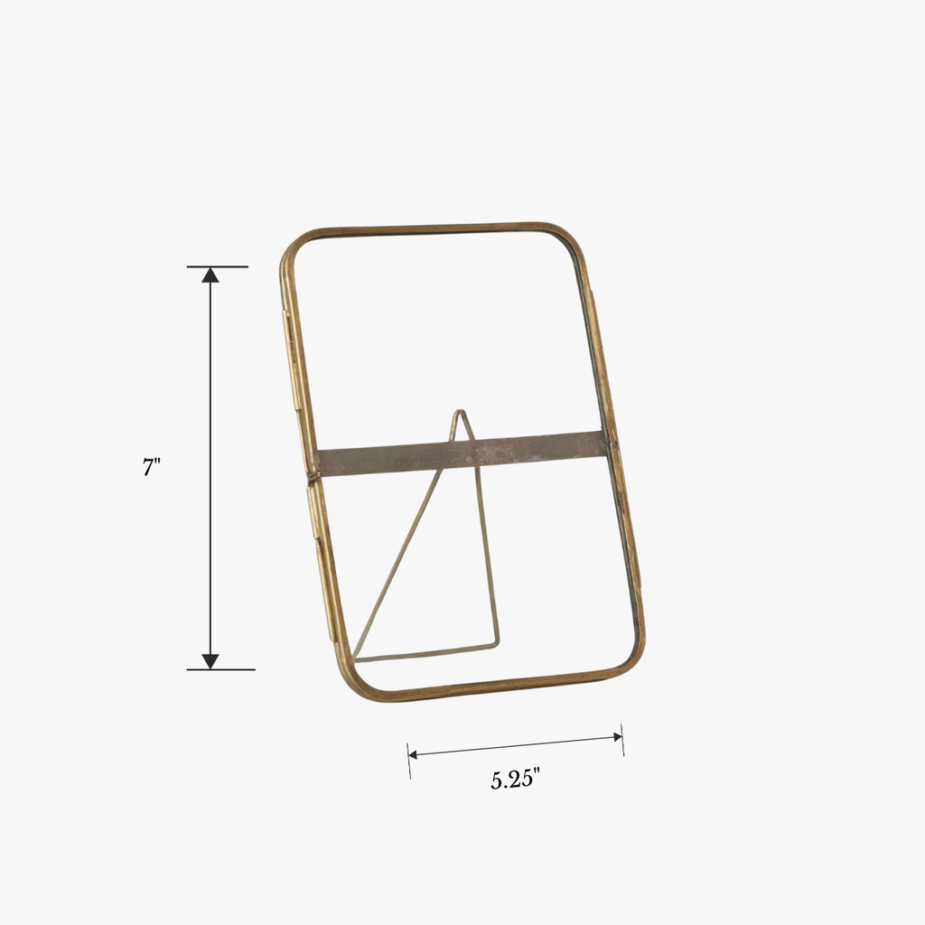 Brass photo frame with dimensions on a white background