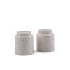 ceramic salt & pepper shakers with speckled texture on a white background