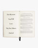 Open book with text about 'The Five Minute Journal' on a white background
