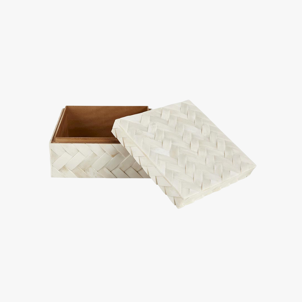 Woven white box with a wooden interior on a white background
