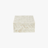 Decorative box with woven pattern on a white background