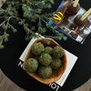 Decorative Moss Balls in Dough Bowl on Coffee Table