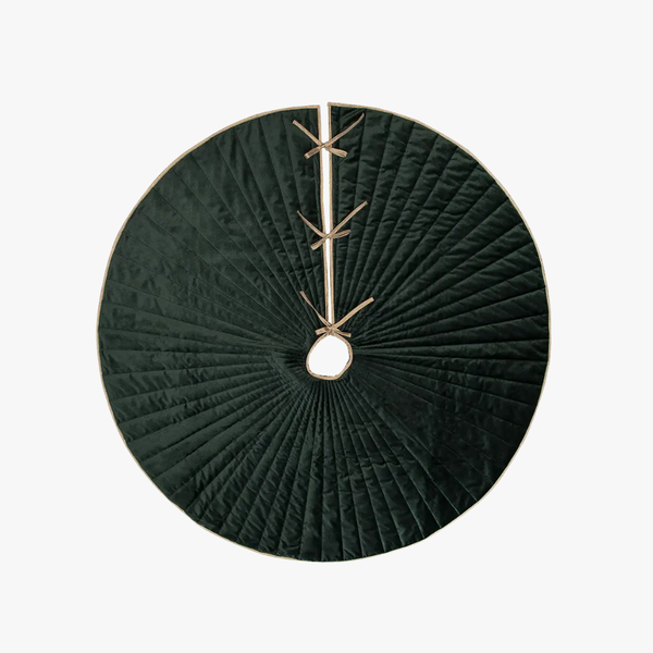 Decorative Velvet Tree Skirt with green quilted design and gold accents on a white background