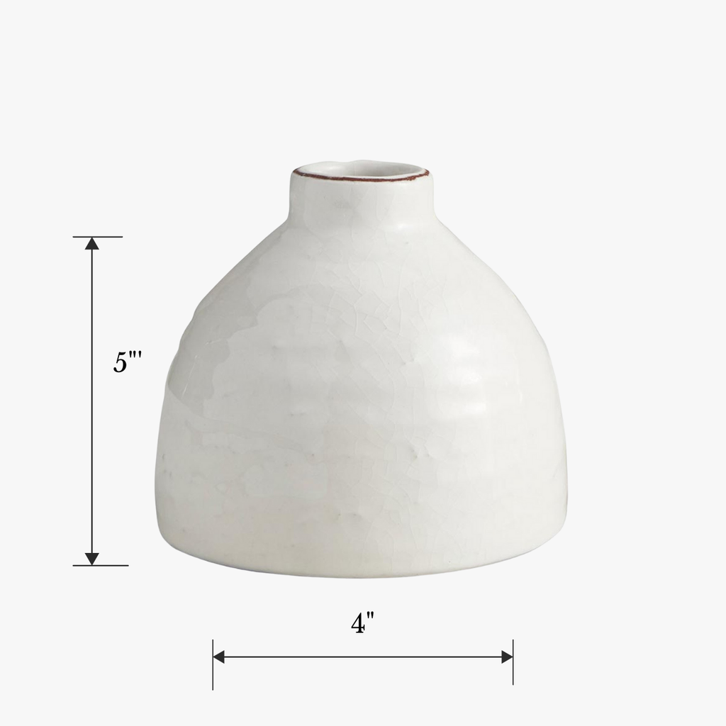 White ceramic vase with dimensions indicated on a white background