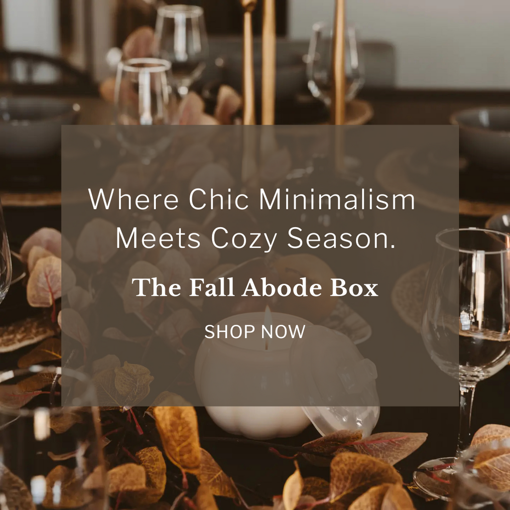 Decorative table setting with glasses and candles, overlaid with text promoting a fall-themed product box.