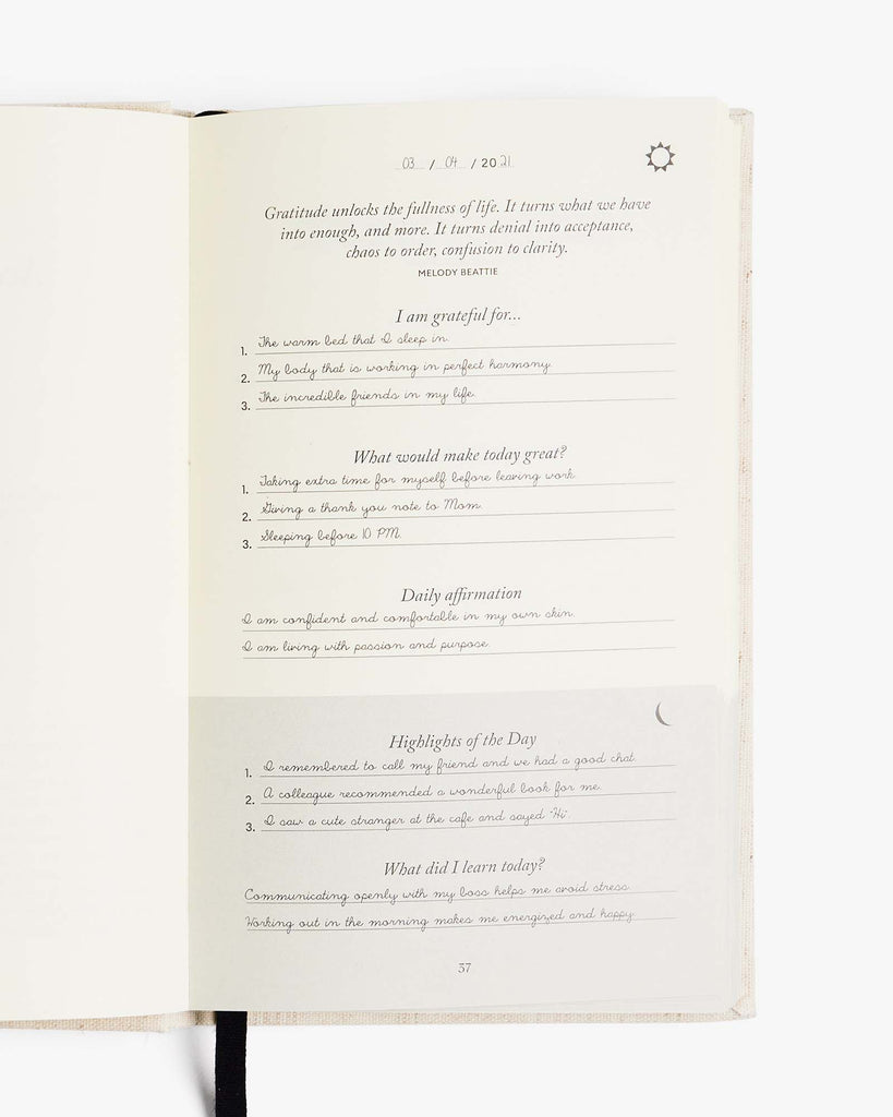 Open notebook with text on a white background