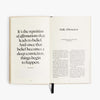 Open book with text on a white background