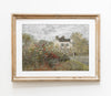 Framed painting of a garden scene with a house and trees on a white wall.