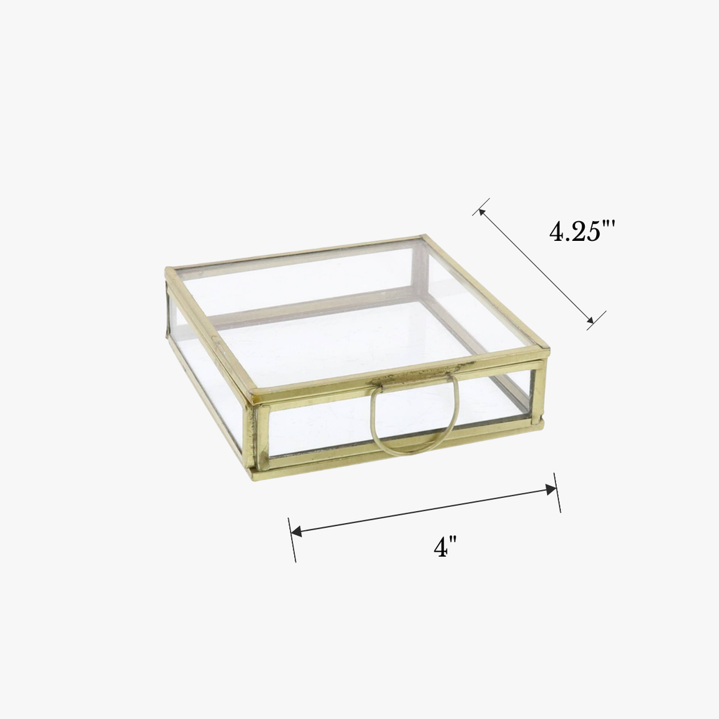 Glass display case with gold frame and dimensions on a white background