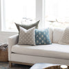 Grey and White Fleur Pillow Cover on Couch