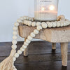 Handmade Wooden Riser with candle and decorative beads