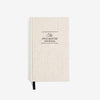 Beige journal with 'The Five Minute Journal' text on a white background