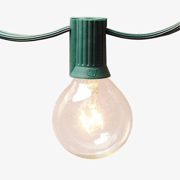 Light bulb with green base on a white background