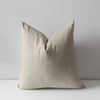 Checkered pillow on a light gray background