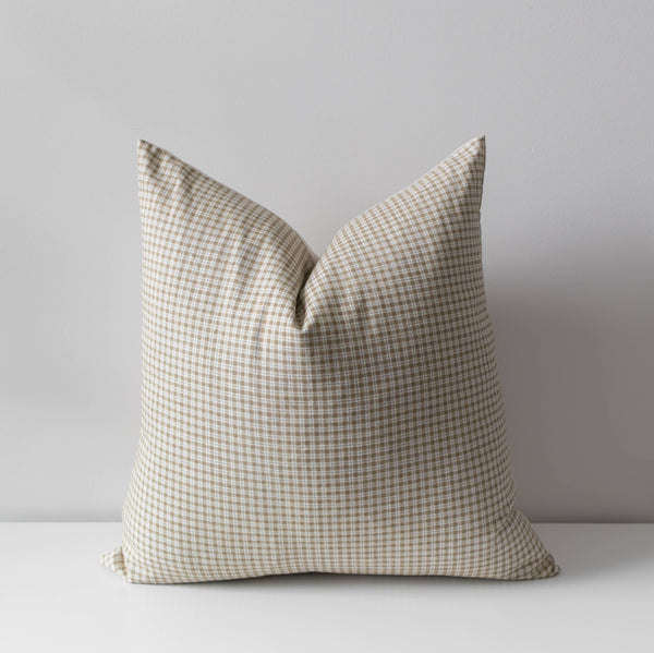 Checkered pillow on a light gray background