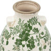 White ceramic vase with green floral patterns on a white background