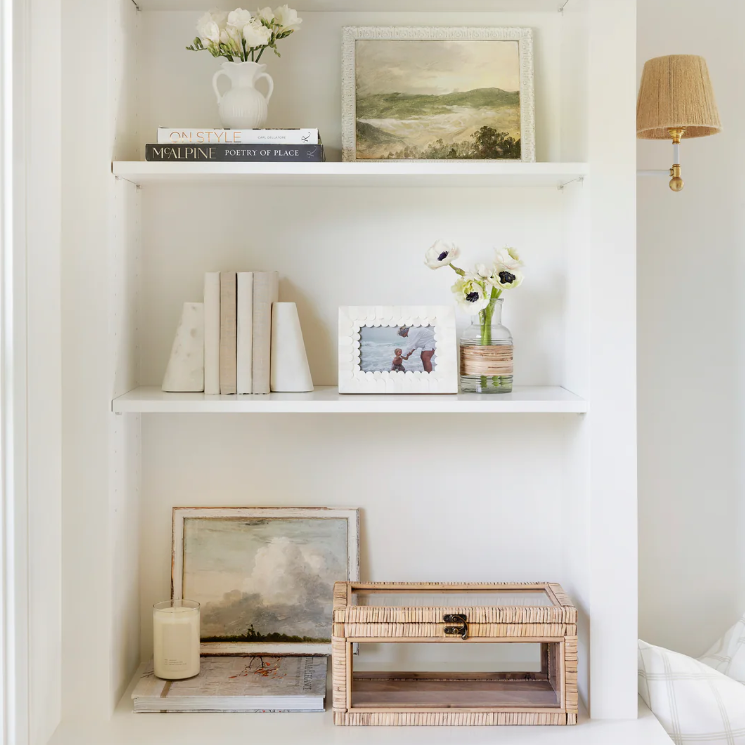 Scallop Photo Frame styled in a neutral bookshelf