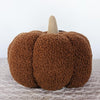 sherpa pumpkin pillow in a rust color