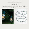 Electric string lights with globe bulbs on a white background