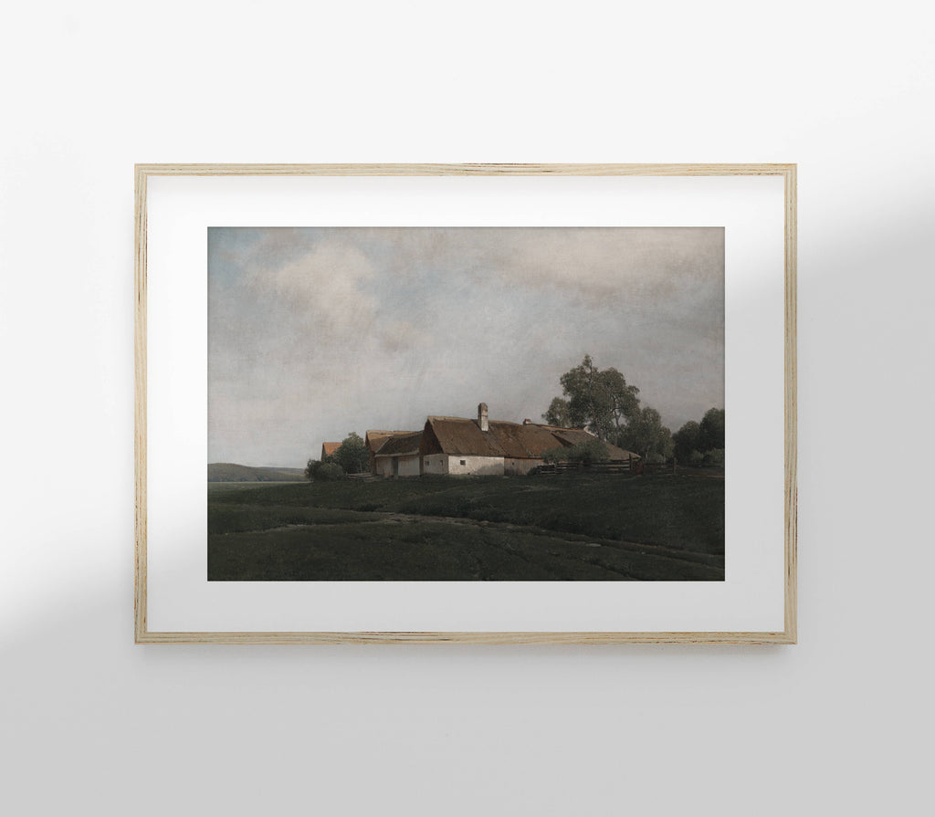 Framed painting of a rural landscape with a house and trees on a white wall