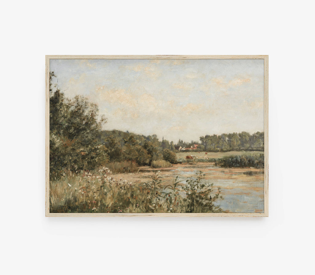 Framed landscape painting of a field with trees and sky.