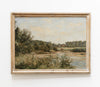 Framed landscape painting of a river and trees on a white wall