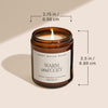 Candle in a glass jar with dimensions labeled on a beige background