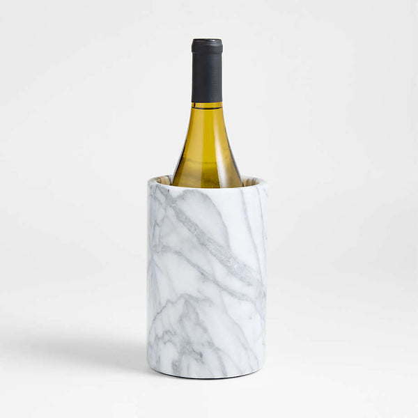 Marble-textured wine cooler with a bottle of white wine on a light gray background