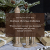 Wooden figurine with text overlay about the Winter Abode Box Heirloom Christmas Collection.