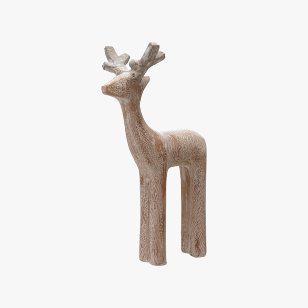 Wooden deer figurine on a white background