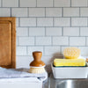 bamboo dish brush on kitchen counter