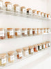 glass spice jars on rack