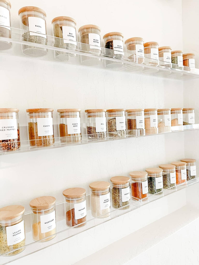 glass spice jars on rack