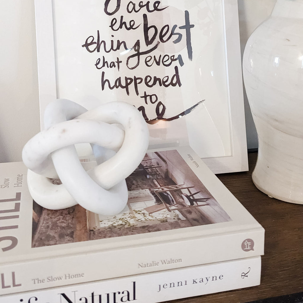 marble knot on coffee table books