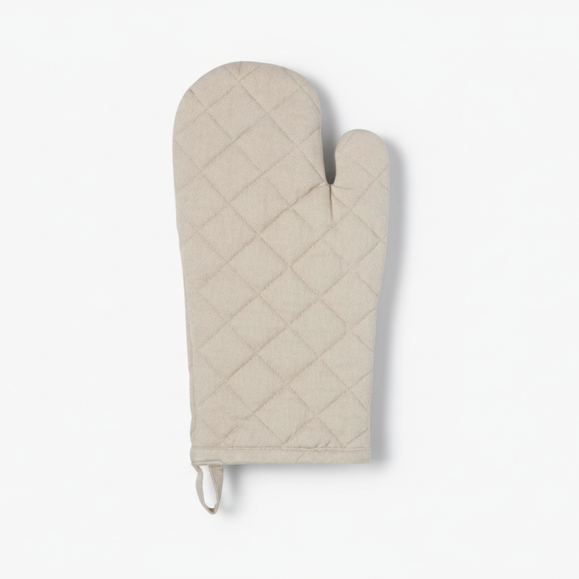 Grey quilted oven mitt on a white background