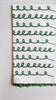 Christmas Tea towel in green and white colors.