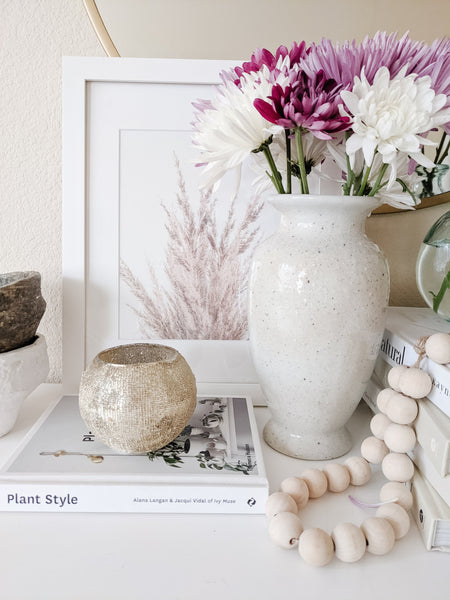 White Ceramic Vase with flowers