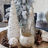 White Yarn Christmas Tree Figurine displayed on gold tray with christmas decorations