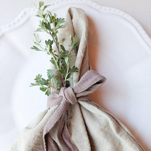 beige linen napkin on plate