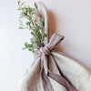 beige linen napkin with ribbon