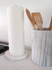 white marble paper towel holder in kitchen