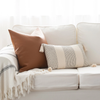 stripe lumbar pillow on white couch