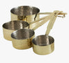 set of gold measuring cups