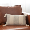 stripe lumbar pillow on leather couch