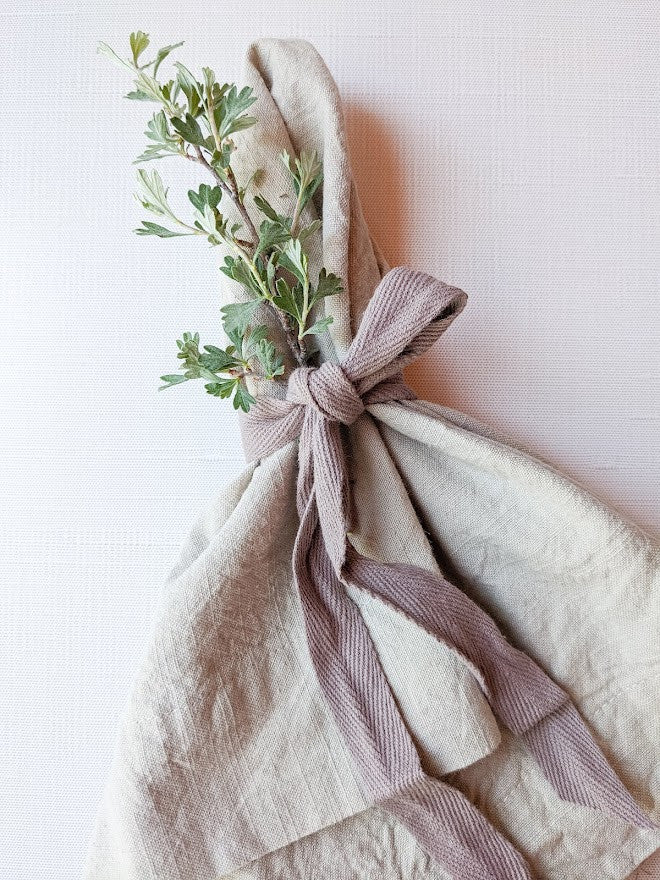 beige linen napkin with ribbon