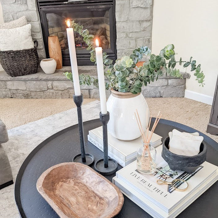 modern black candle holder on coffee table
